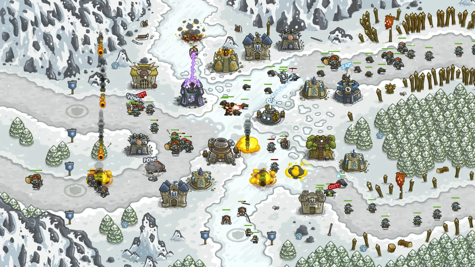 A snowbound Kingdom Rush level mid-wave: towers lining a winding path while ranks of enemies advance along it